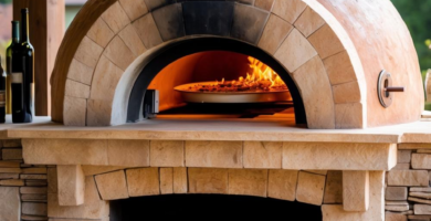 A rustic outdoor pizza oven made of stone and brick, set in a cozy backyard cooking area.