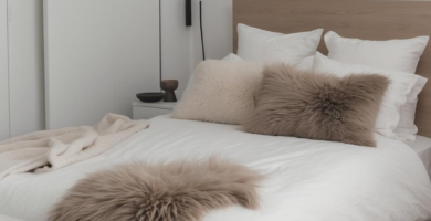 A minimalist Viking-chic bedroom featuring neutral tones, plush textures, and a clean-lined wooden bed.