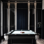 A modern billiards room with dark walls, a sleek pool table, and sophisticated lighting.