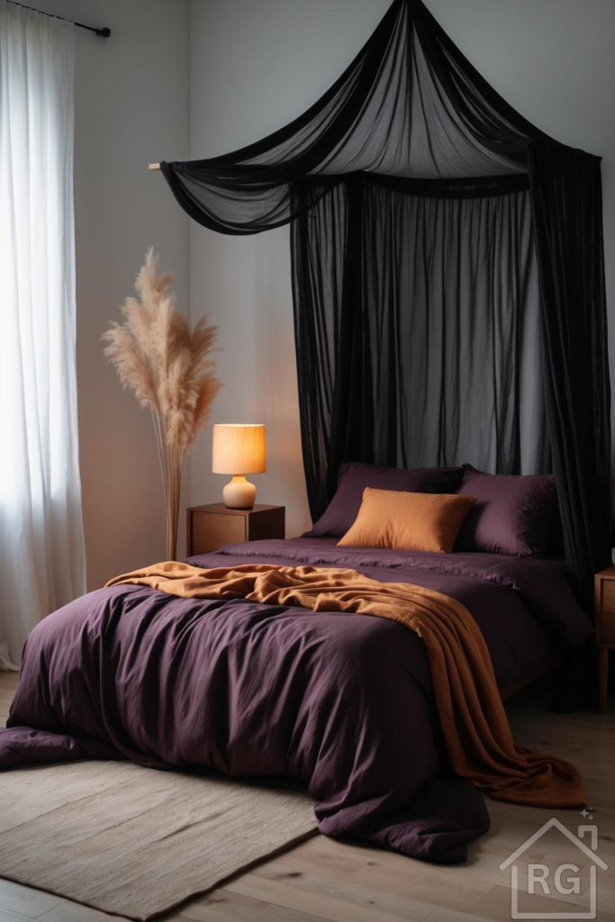 A cozy dark boho bedroom featuring a bed with deep plum bedding and a black sheer canopy. The room is decorated with warm fall accents like a burnt orange throw, pampas grass, and a soft glow from a bedside lamp, creating an inviting and tranquil atmosphere.